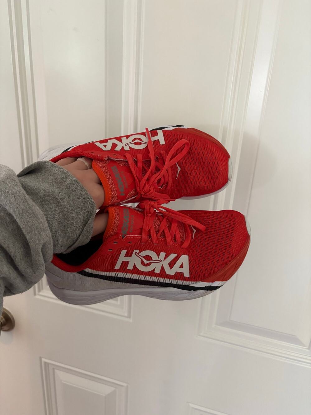 Hoka Rocket X running shoes in the Fiesta/Black Women’s 7.5 / Men’s 6.5.